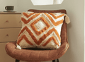 Coussin beige à motif losange orange 45x45 cm NIVLA