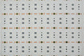 Tapis écru à motifs géométriques verts et orange 200 x 290 cm LOANE